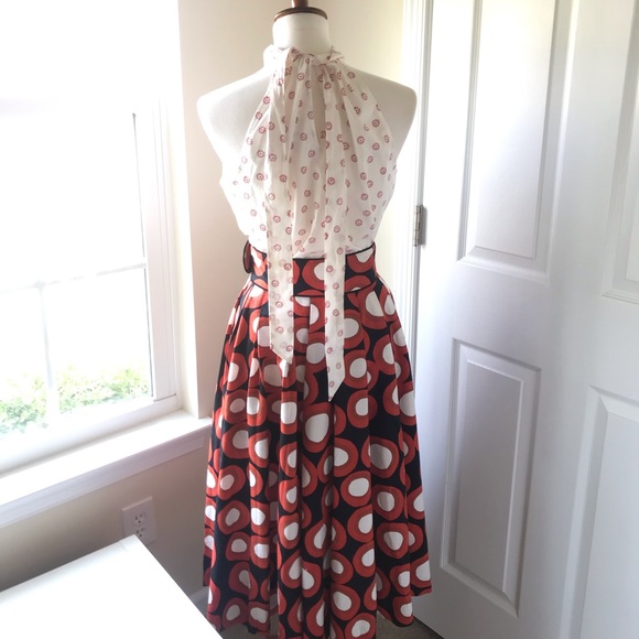 Styled! Outfit includes: earrings, top, skirt. - Picture 3 of 8